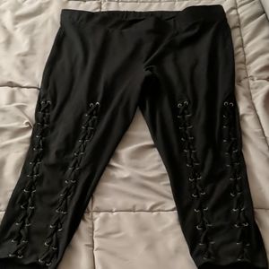 Torrid size 5 black leggings with cross tie detail